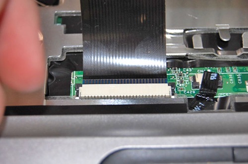 Step 14 - Reinsert ribbon cable